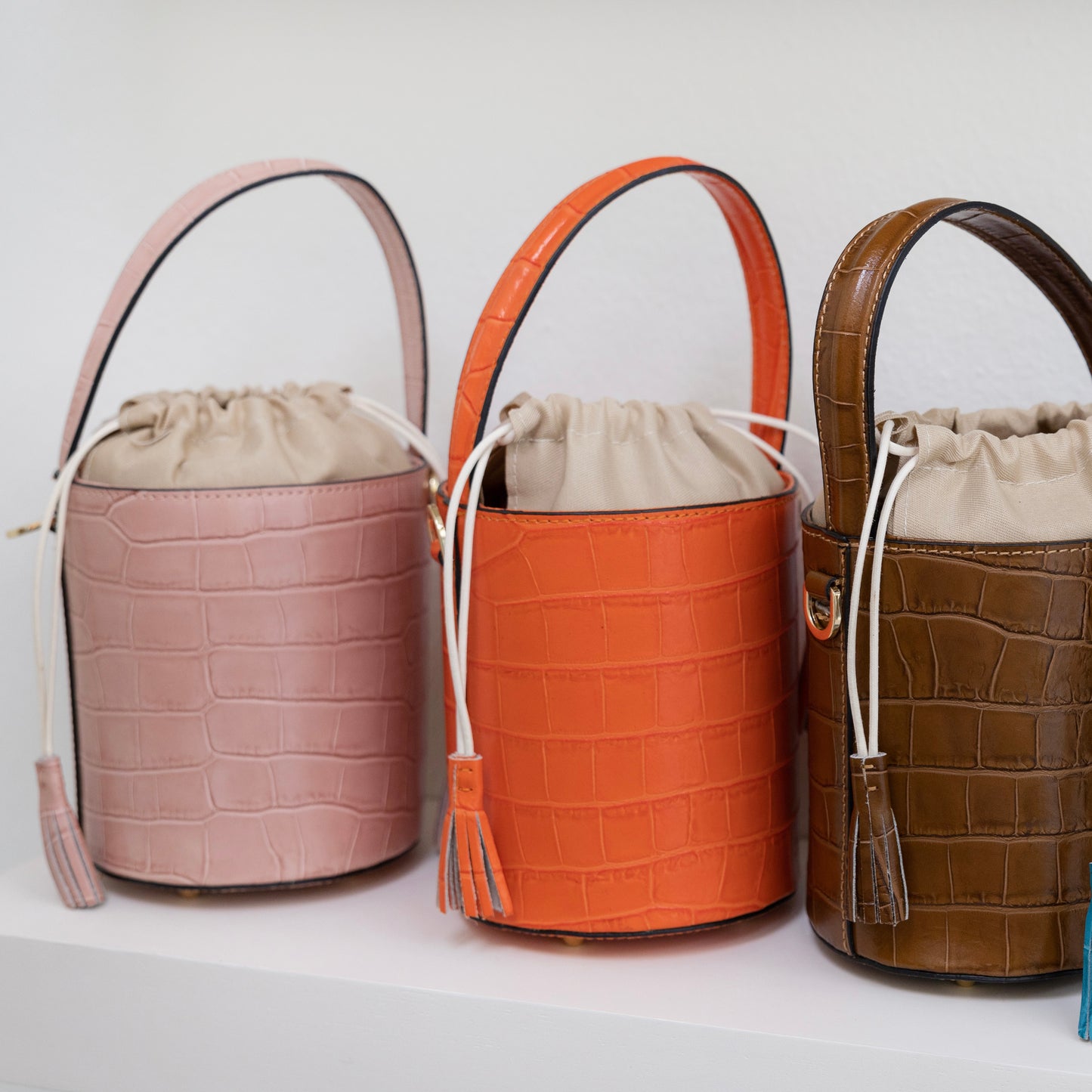 Light Pink Crocodile Embossed Leather Bucket Bag