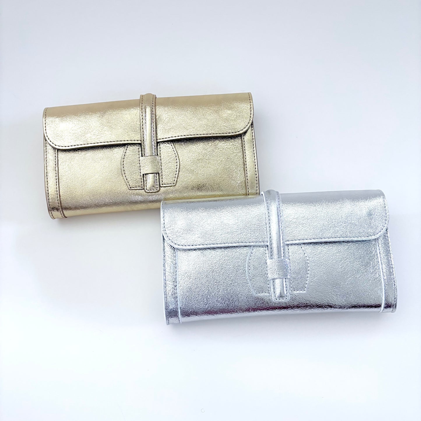 Metallic Silver Monet Leather Clutch