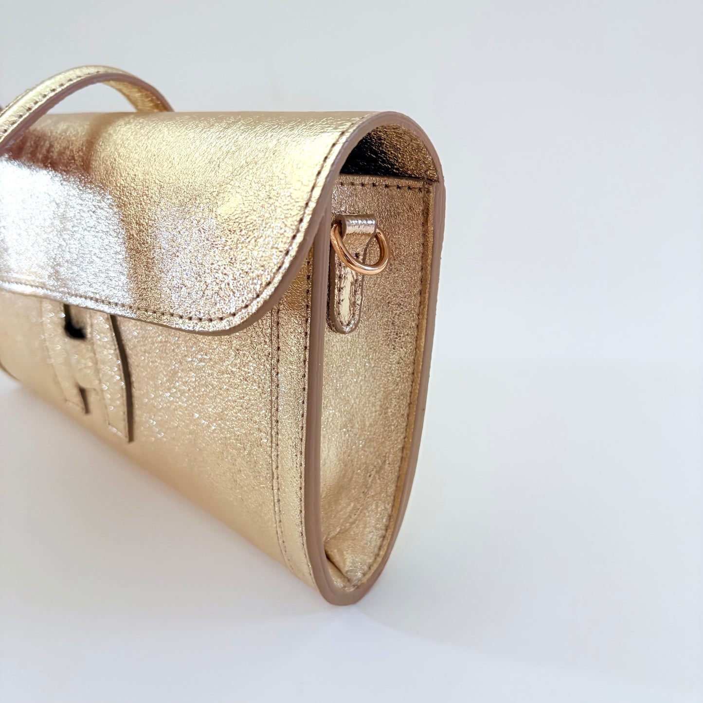 Metallic Gold Monet Leather Clutch