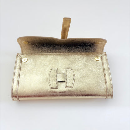 Metallic Gold Monet Leather Clutch