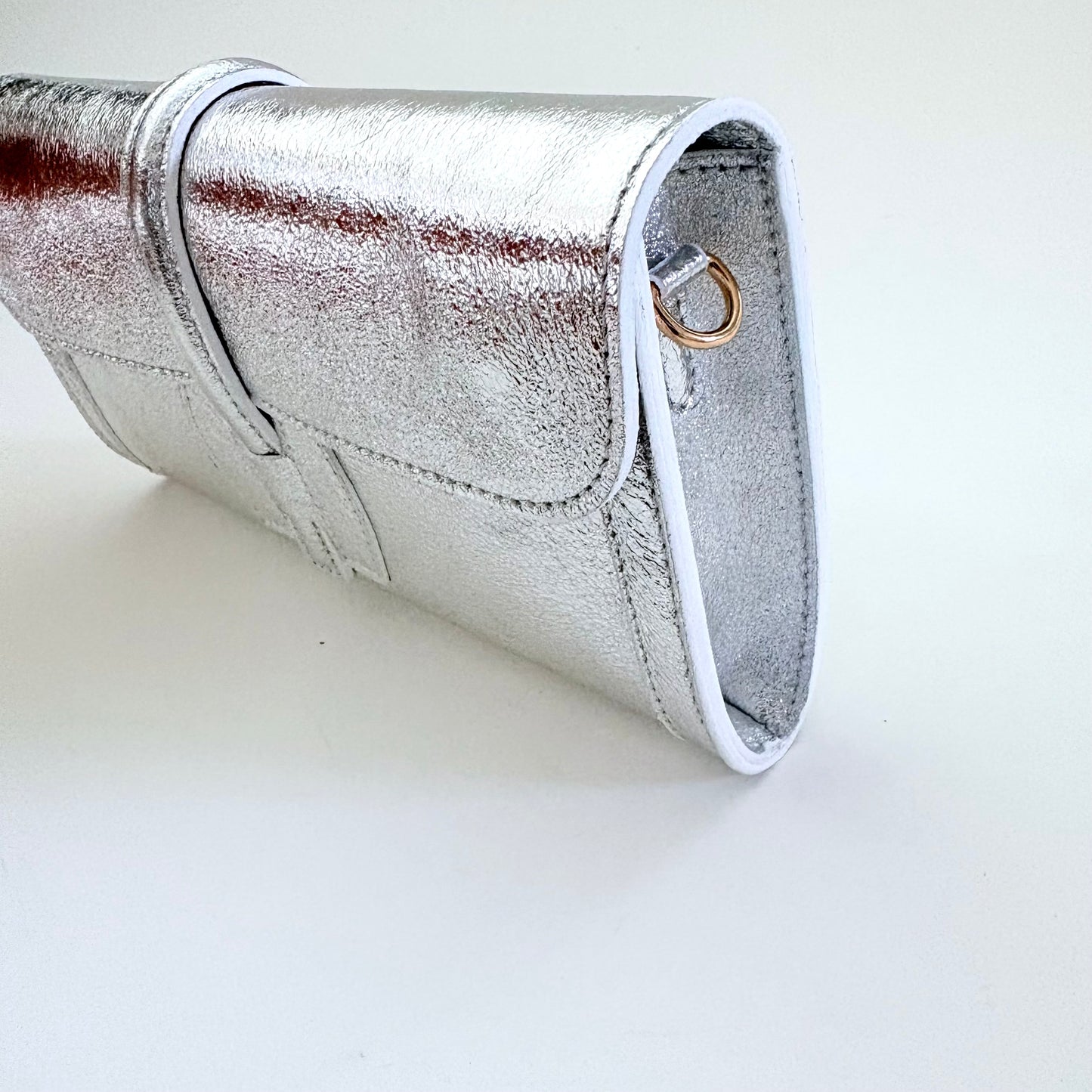 Metallic Silver Monet Leather Clutch