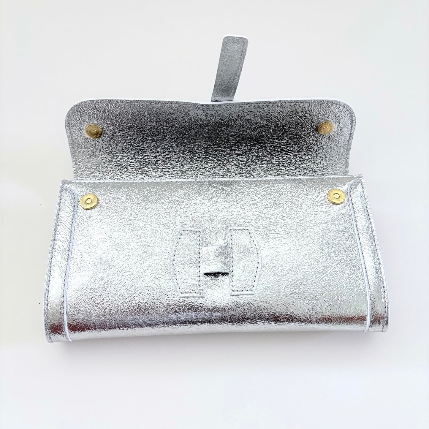 Metallic Silver Monet Leather Clutch
