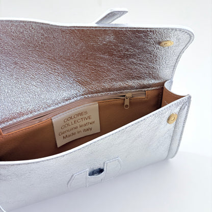 Metallic Silver Monet Leather Clutch